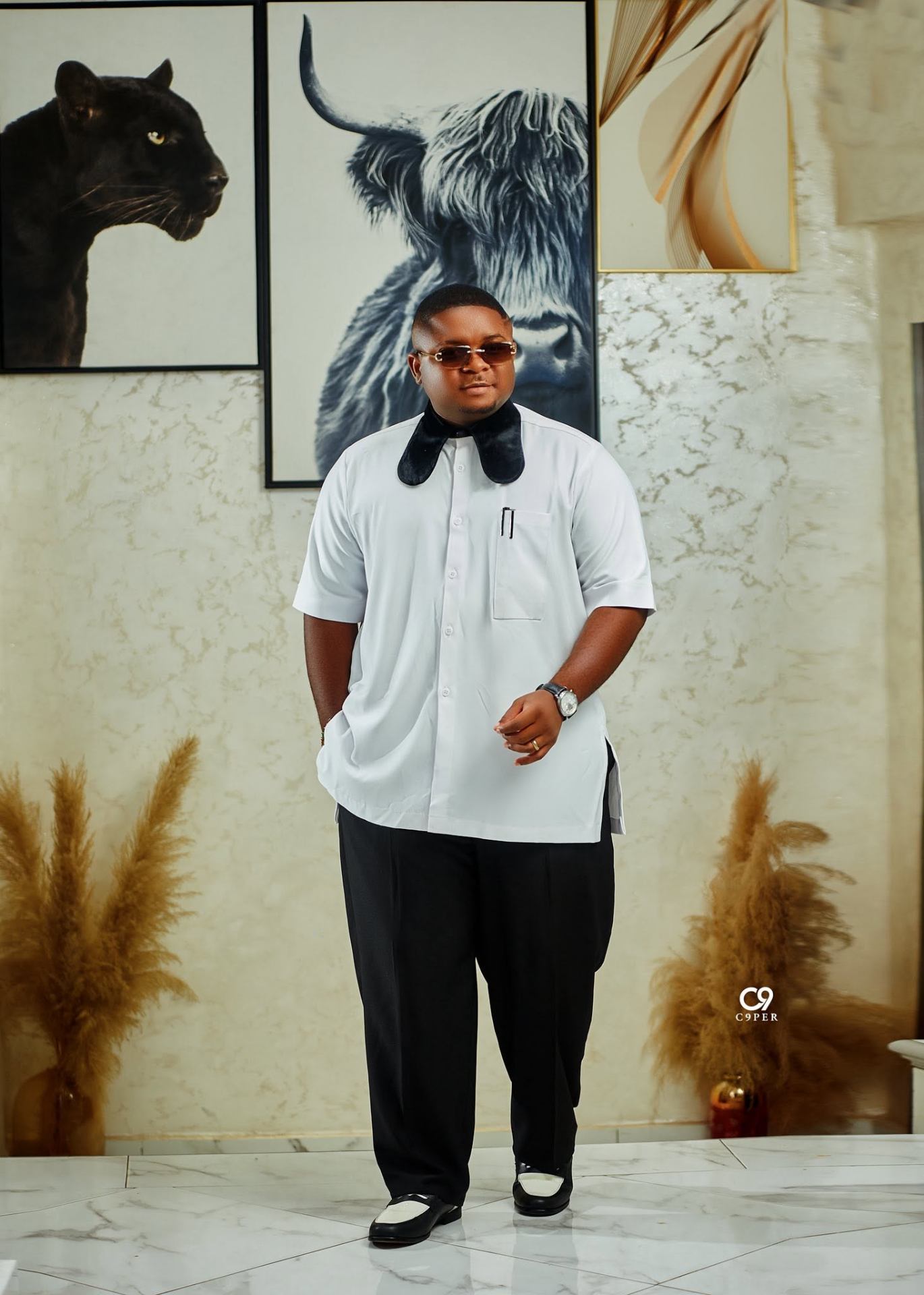 Enock Darko in white kaftan