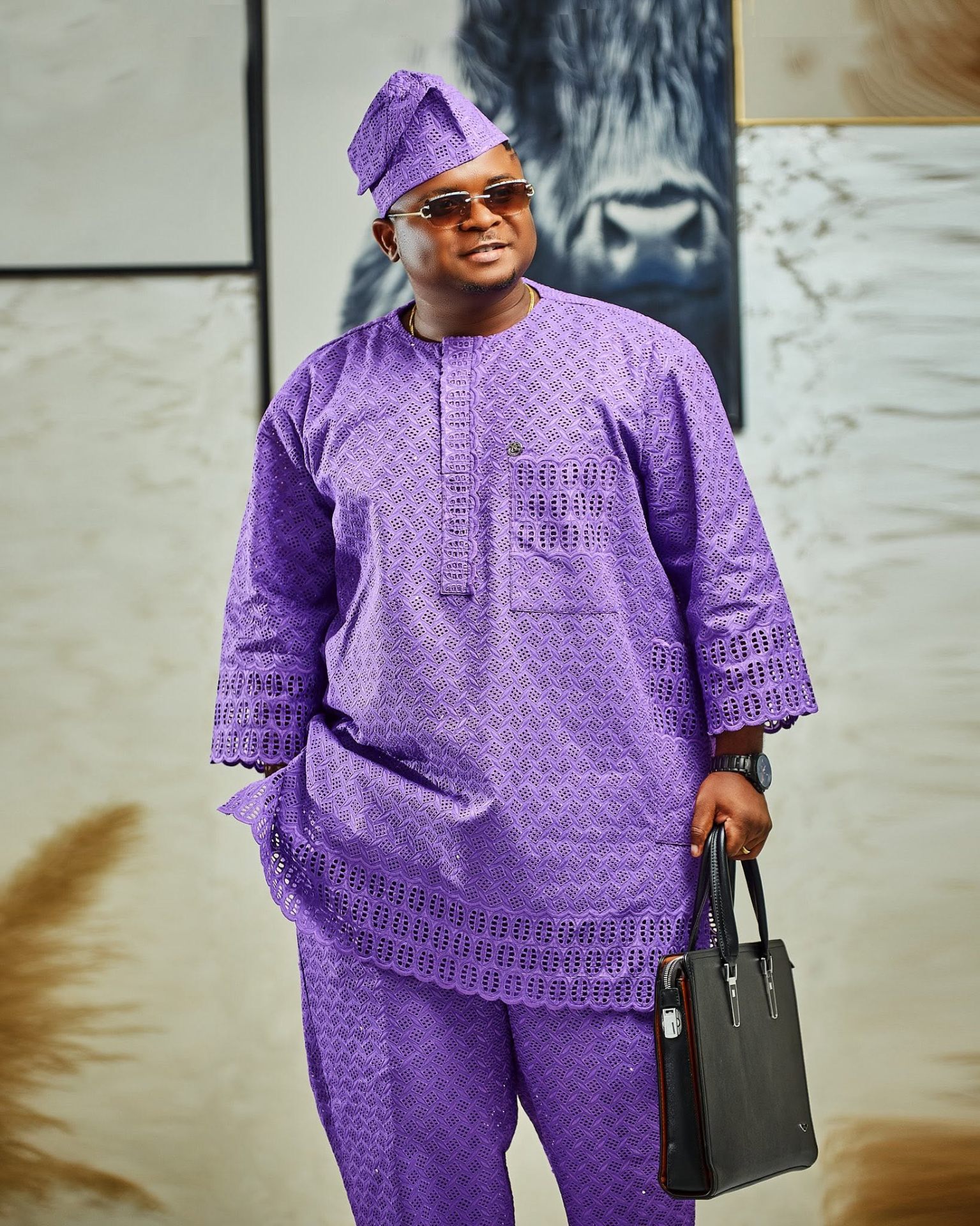 Enock Darko in purple agbada